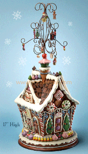 Jim Shore Christmas gingerbread house Advent calendar is a unique Christmas gift, standing 17.25" high, on a revolving base.  It's brown (like a good gingerbread house should be), and is decorated with icing-looking embellishments.  Just beautiful!